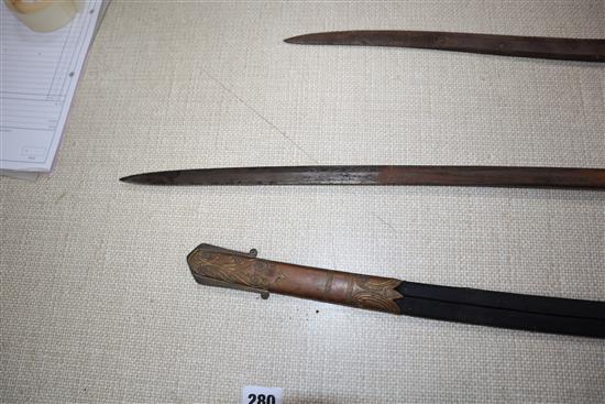 Two officers swords and a bayonet